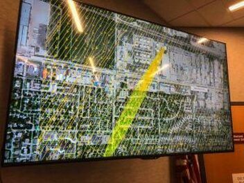 LR-x plume model of the Magellan fuel terminal fire shown on a large wall display